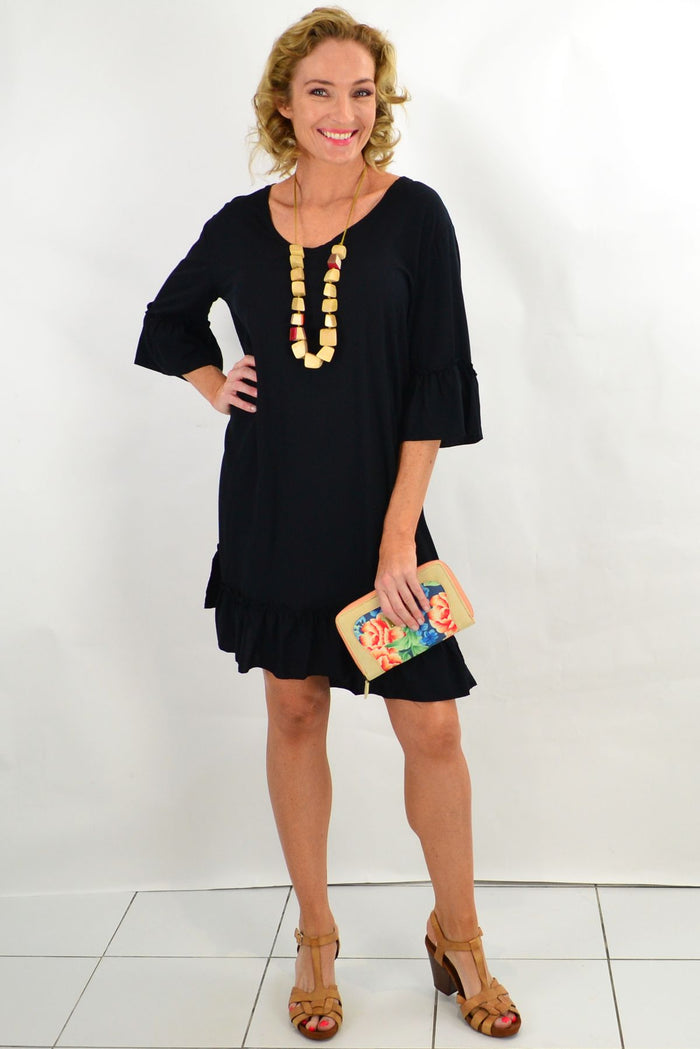 Black ruffle 3/4 sleeve tunic dress by I Love Tunics, featuring flowy fabric and stylish ruffle details.