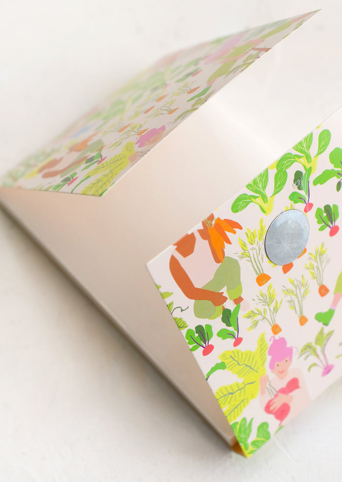 A notebook with gardener print cover.