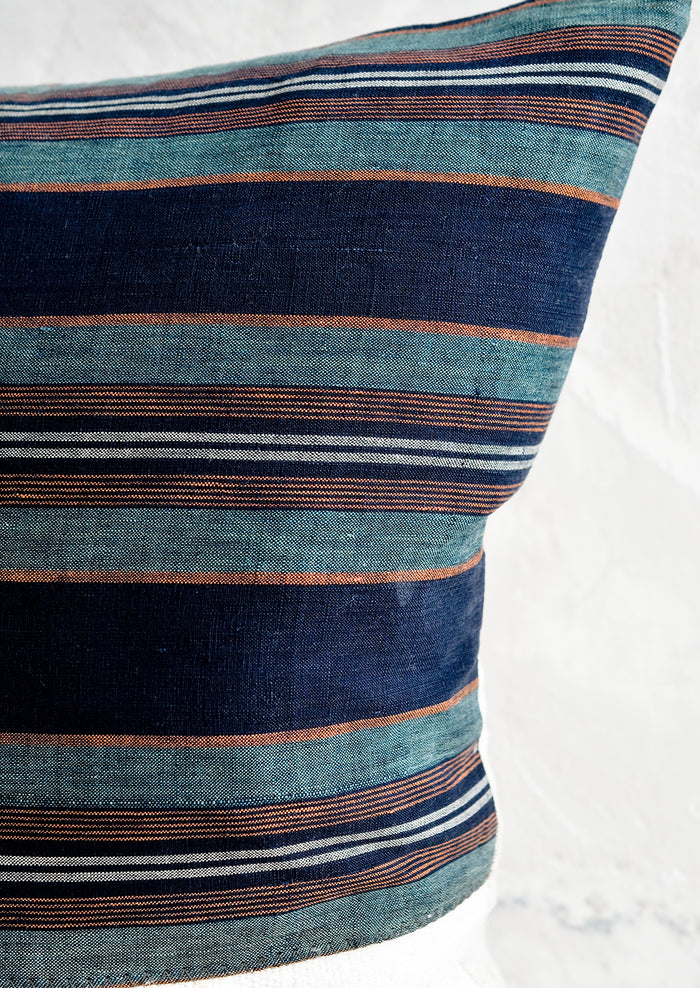 Striped japanese hemp fabric in indigo, teal, orange and white.