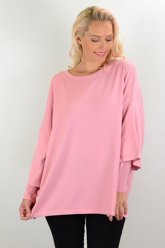 Cali&Co Lush Pink Debs double sleeve tunic jumper with long sleeves and relaxed fit, displayed on a hanger.