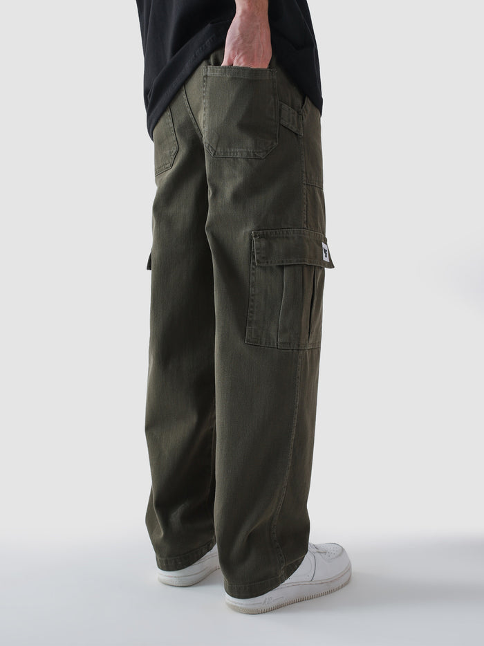 Military green cargo pants male model back view relaxed fit Pakistan – GROOVY
