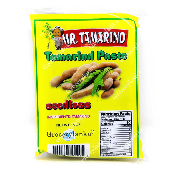 Packaging of Mr. Tamarind Tamarind Paste with tamarind pods on a yellow background