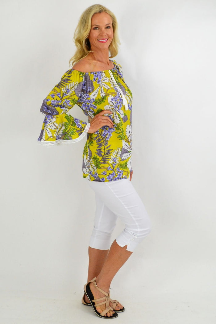 Mustard tropical floral tassel off-shoulder tunic top by Missy Q, featuring vibrant summer print and tassel details.