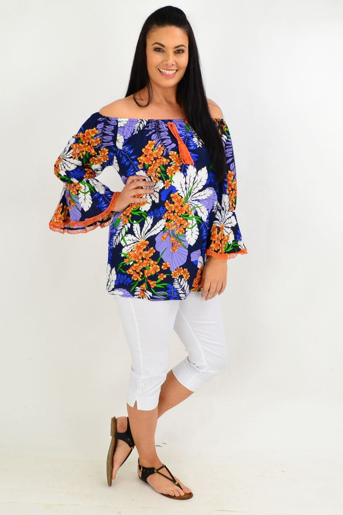 Navy and orange tropical off-shoulder tunic top by Missy Q with vibrant floral print and relaxed fit, perfect for summer wear.