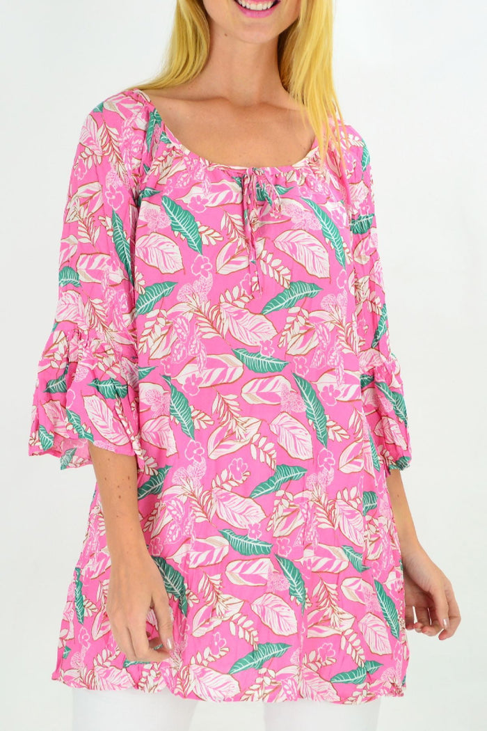 Pink floaty leaf crinkle tunic top by Hourglass, shown flowing fabric with leafy pattern and relaxed fit.