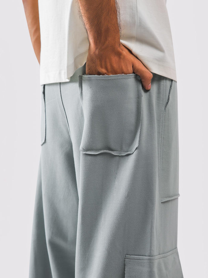 Elastic waist and drawstring on grey cargo trousers - GROOVY Pakistan