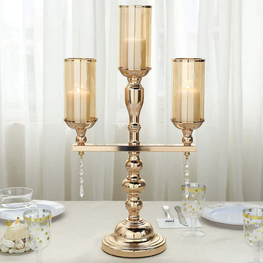 Elegant three-arm candle holder with glass shades and crystal accents.