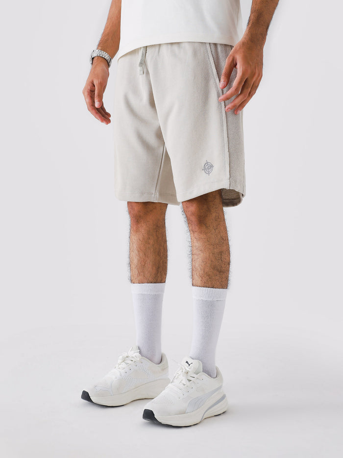Man wearing Ash Grey Aim Shorts, GROOVY men's sport and lounge shorts, Pakistan streetwear
