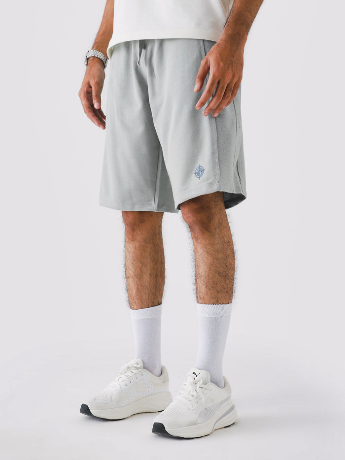 Man wearing Cool Grey Aim Shorts, GROOVY men's sport and lounge shorts, Pakistan streetwear