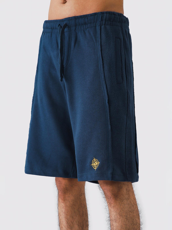 Man wearing Deep Blue Aim Shorts, GROOVY men's sport and lounge shorts, Pakistan streetwear