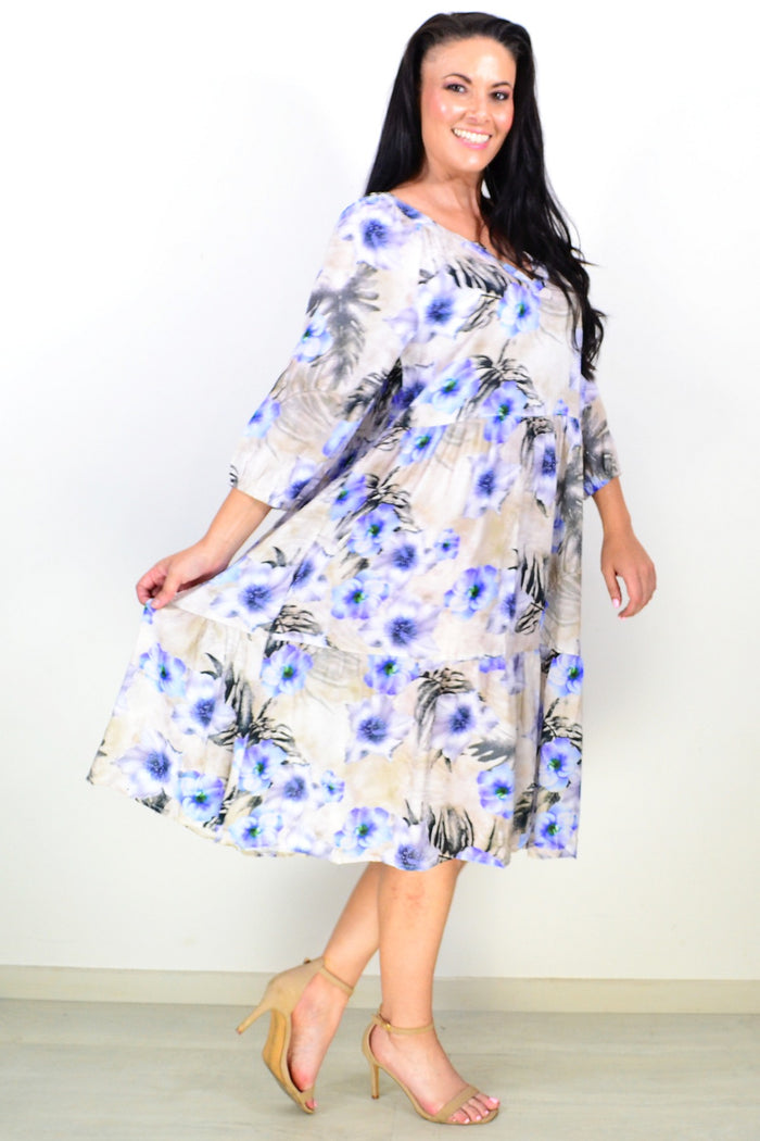Beige and blue floral midi tunic dress by Hourglass, featuring a relaxed fit, lightweight fabric, and elegant floral pattern.