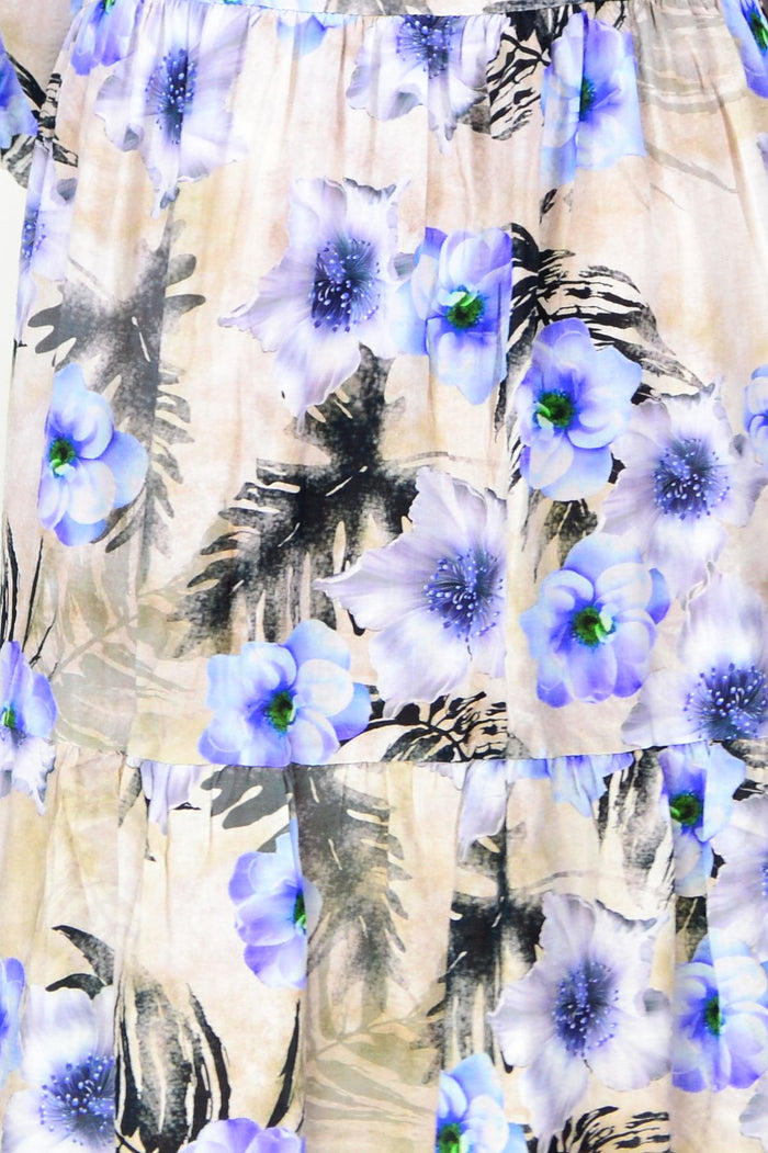 Beige and blue floral midi tunic dress from Hourglass, featuring a relaxed fit with long sleeves and a flowing hem.