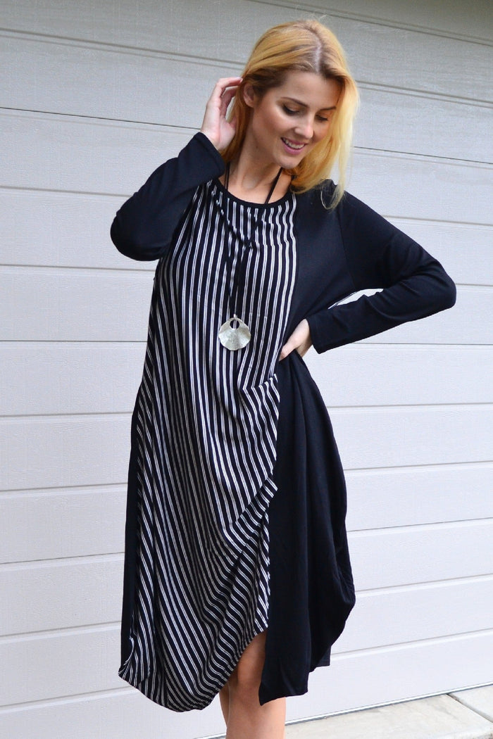Black 3/4 sleeve stripe jersey tunic dress by Whispers, featuring a relaxed fit and stylish horizontal stripe pattern.