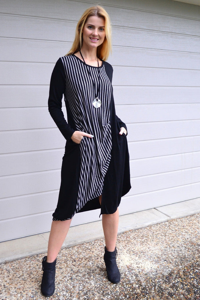 Black 3/4 sleeve stripe jersey tunic dress by Whispers, featuring a relaxed fit and stylish striped pattern.
