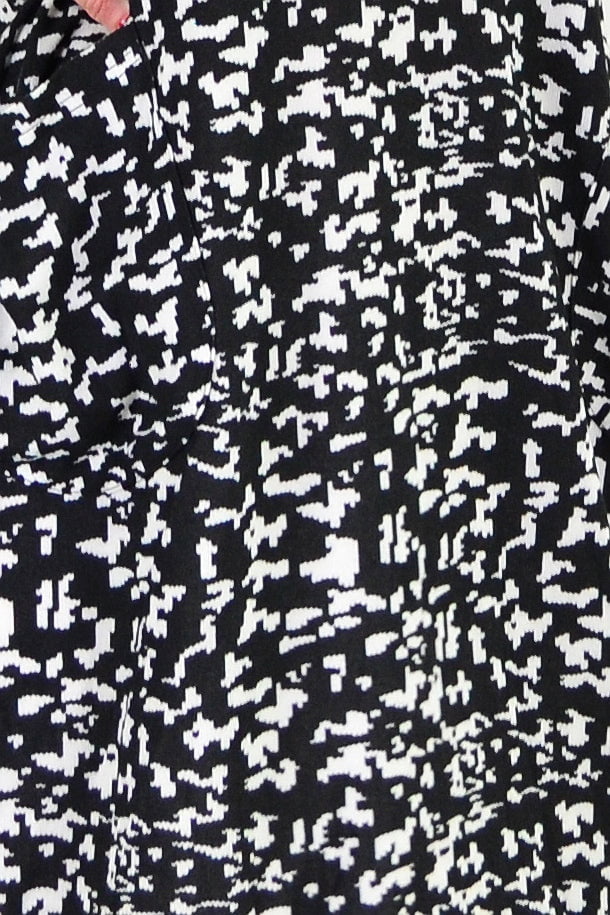 Black Digitech knit tunic top from I Love Tunics, featuring a cozy, fitted design with long sleeves and a round neckline.