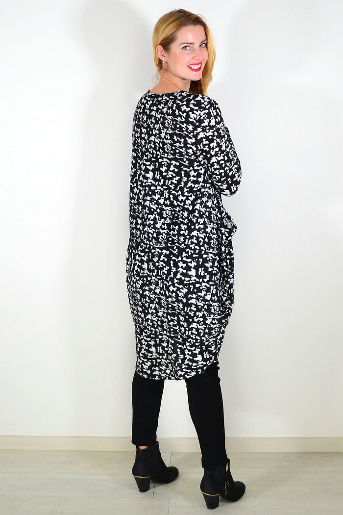 Black Digitech knit tunic top by I Love Tunics, featuring a relaxed fit and textured fabric, displayed on a plain background.
