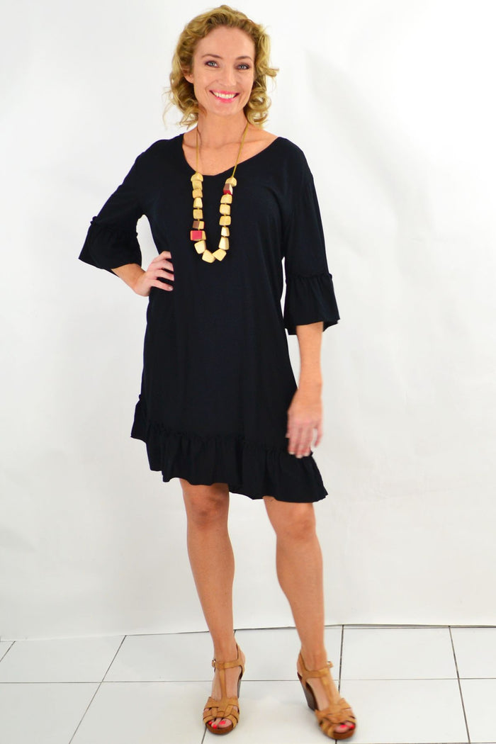 Black ruffle 3/4 sleeve tunic dress by I Love Tunics, featuring a flowy silhouette and feminine ruffle details.