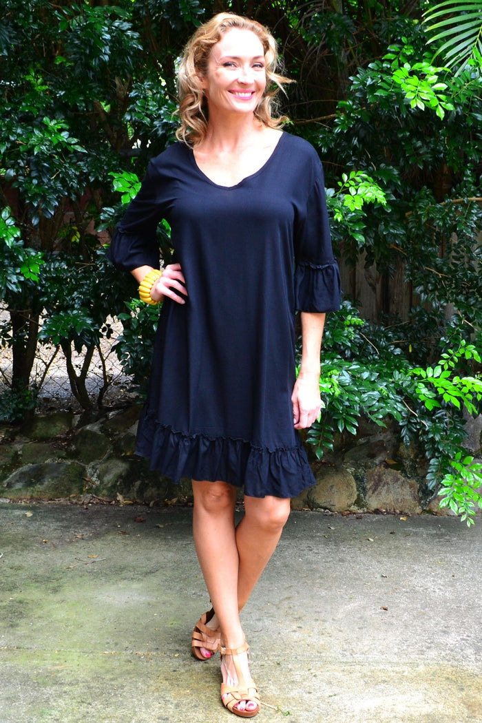 Black ruffle 3/4 sleeve tunic dress by I Love Tunics, featuring a flowy silhouette and stylish ruffle details.
