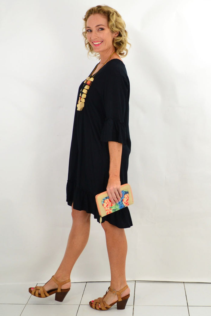 Black ruffle 3/4 sleeve tunic dress from I Love Tunics, featuring a loose fit and stylish ruffle details.