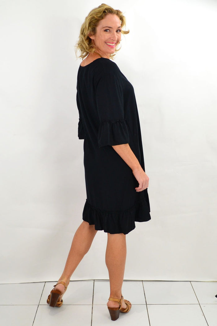 Black ruffle 3/4 sleeve tunic dress by I Love Tunics, featuring a flowy silhouette and stylish ruffle details.
