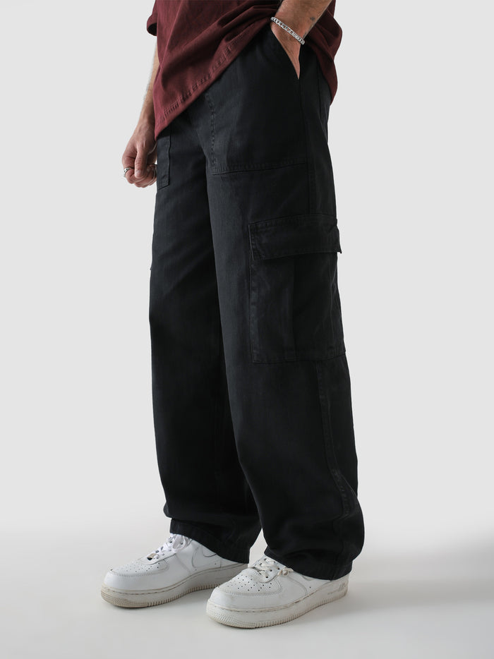 Black VII Cargo pants female model front view wide leg fit – GROOVY Pakistan