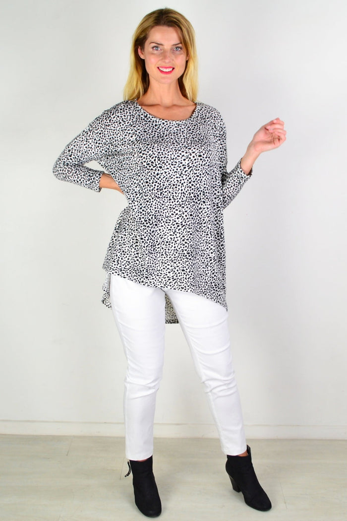 Black and white spot hi-low tunic top by Caroline Morgan, featuring a flowy silhouette and stylish design.