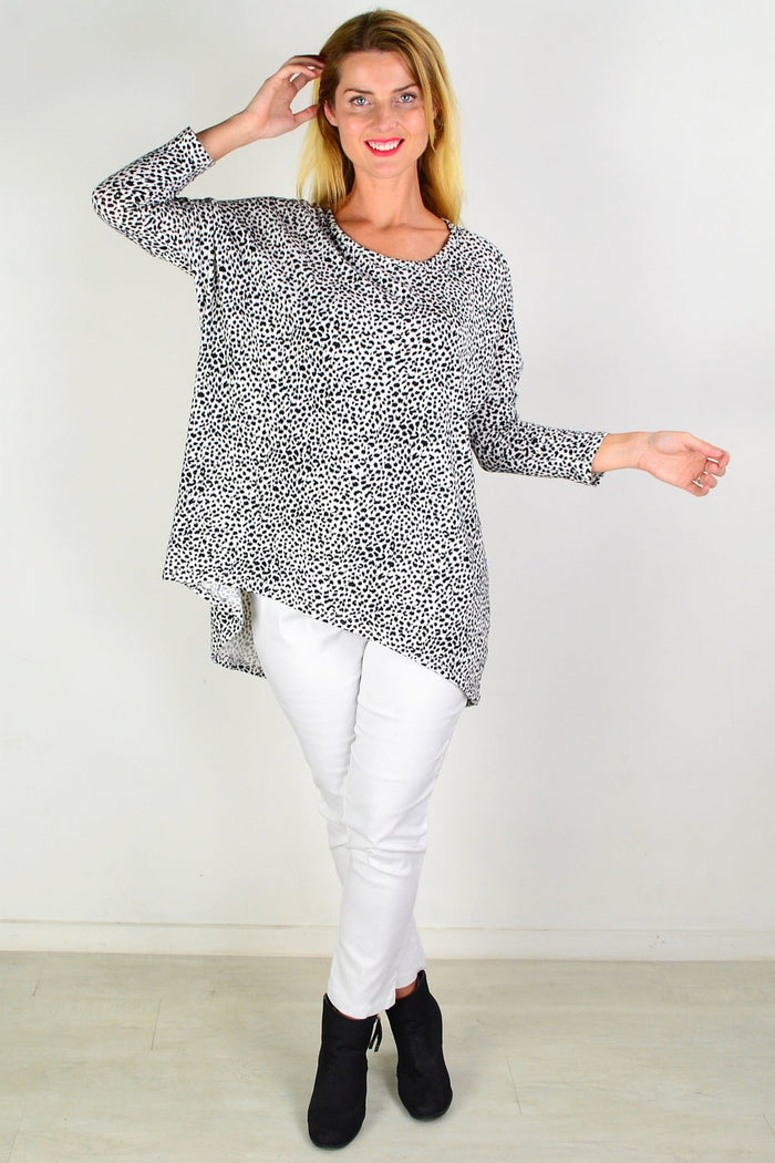 Black and white spot hi-low tunic top by Caroline Morgan, featuring a stylish flowy design and lightweight fabric.