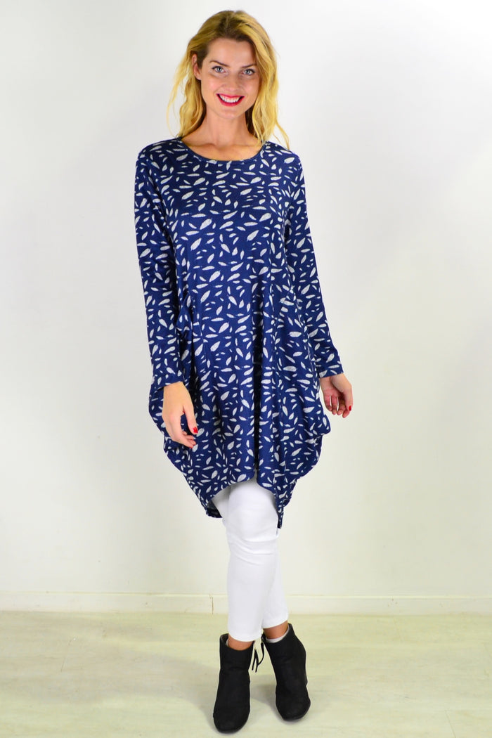 Blue floating leaf knit tunic top by I Love Tunics, shown with a relaxed fit and intricate leaf pattern on soft fabric.
