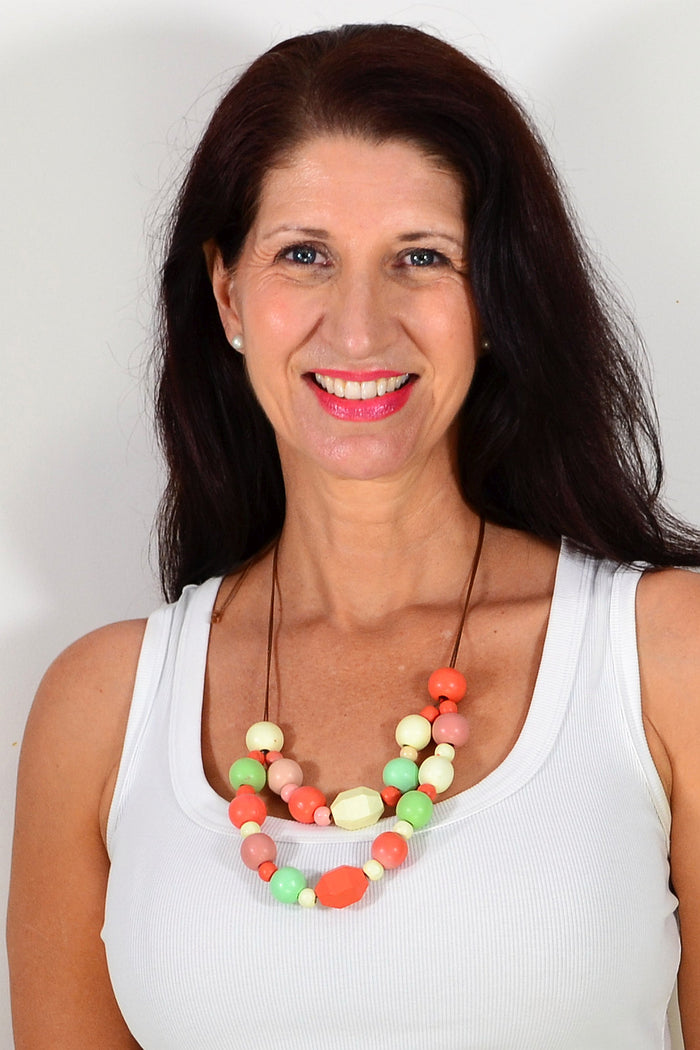 Boho multicolour wooden bead necklace by I Love Tunics featuring adjustable design and natural wooden beads.