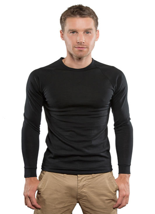 Man wearing Merino long black sleeve thermal top.