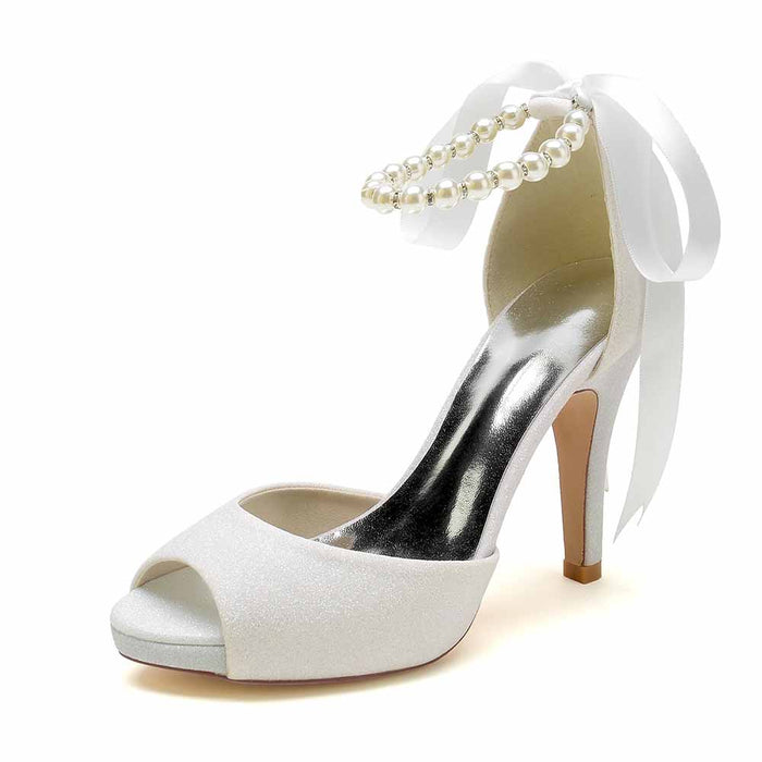 Elegant bridal shoes with pearls and ribbon perfect for weddings and special occasions