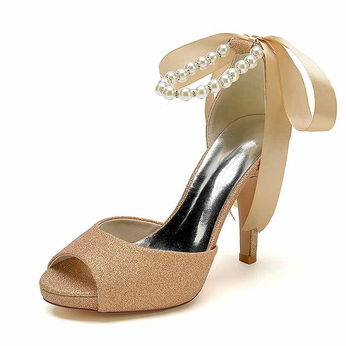 Elegant bridal shoes with pearls and ribbon for a sophisticated wedding look