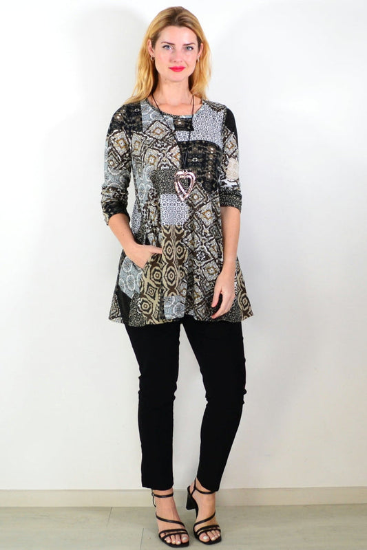 Brown abstract print fleece tunic top by Hourglass Avalon, featuring a cozy, stylish design with a relaxed fit and soft fabric.