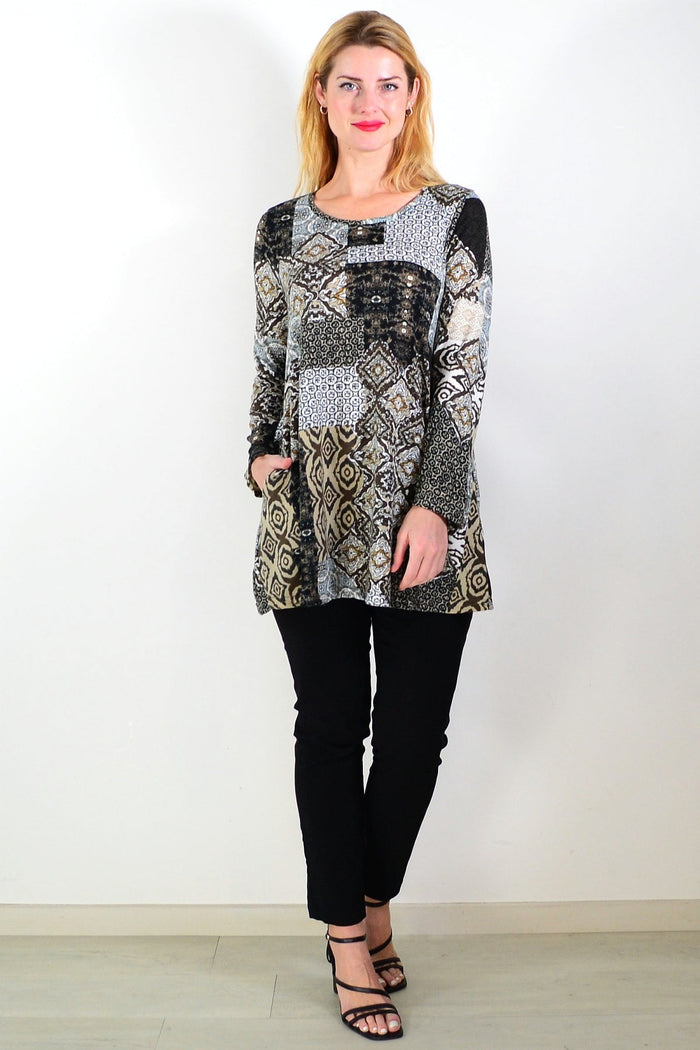 Brown abstract print fleece tunic top by Hourglass Avalon, featuring a cozy, stylish design with a relaxed fit and artistic pattern.