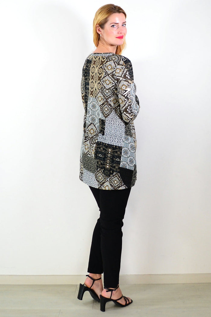 Brown abstract print fleece tunic top from Hourglass Avalon, featuring a cozy, stylish design with a relaxed fit.