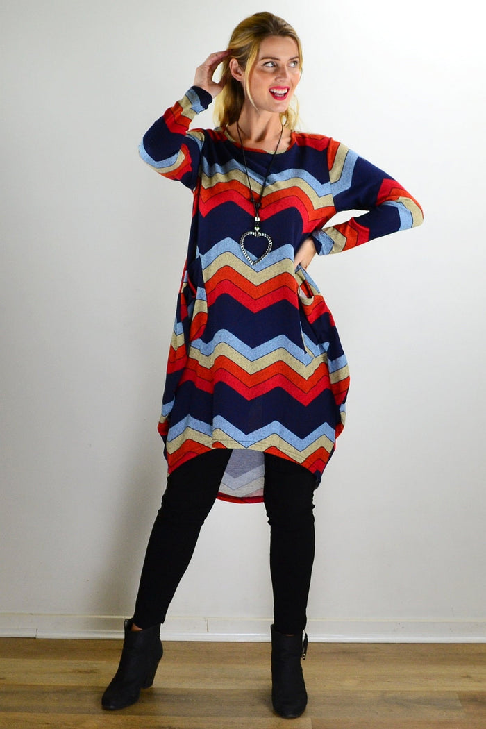 Hourglass Candy Lane wool knit tunic top displayed with its textured fabric, long sleeves, and relaxed fit in a cozy style.