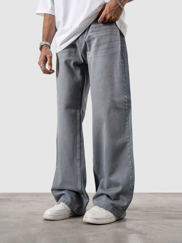 CORE denim dark stone baggy jeans male model back view faded wash Pakistan – GROOVY