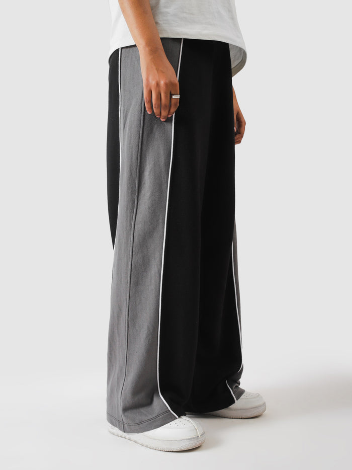 Cotton terry texture on black colour blocked sweatpants - GROOVY Pakistan
