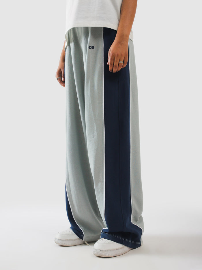 Side profile of sage grey panelled sweatpants - GROOVY Pakistan