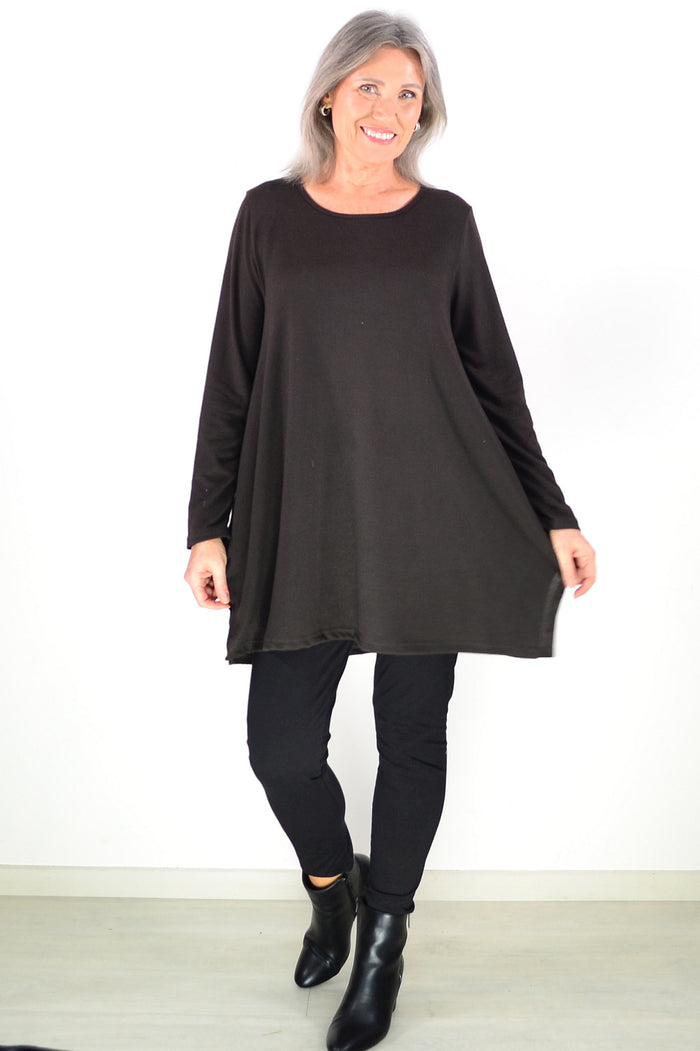 Dark brown fleece tunic top by Hourglass Avalon, cozy winter tunic with long sleeves and a relaxed fit, suitable for cold weather.