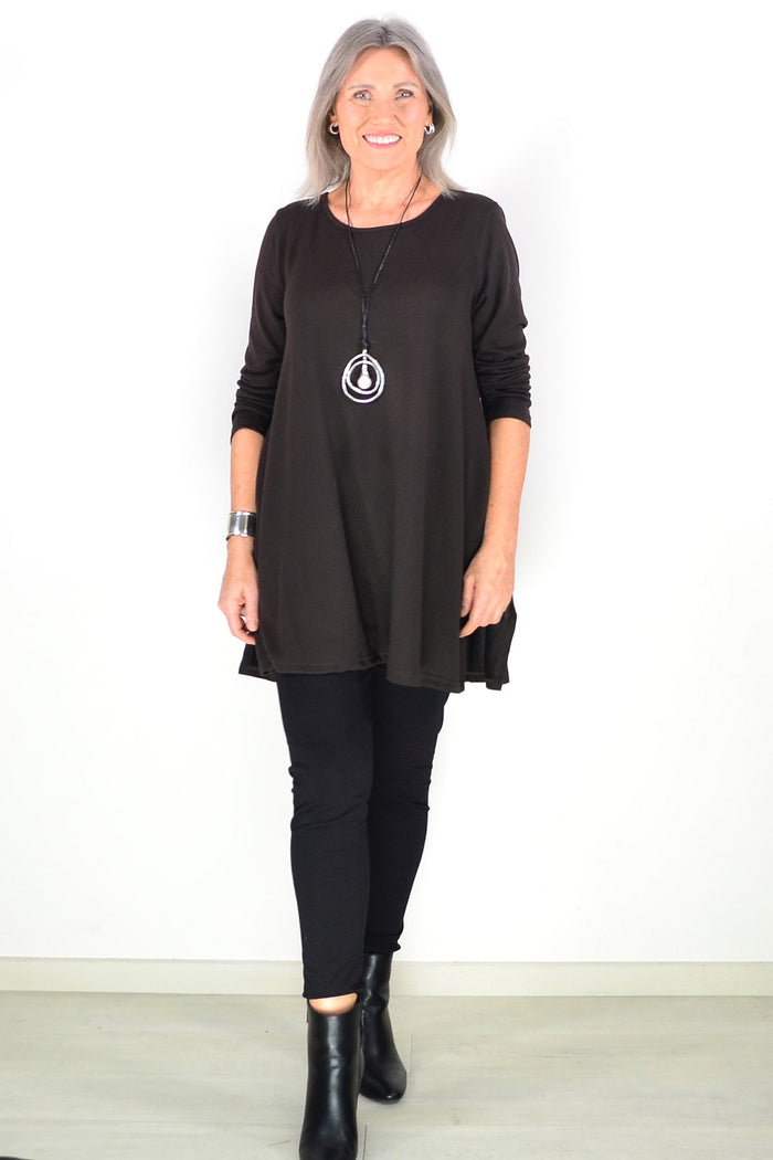 Dark brown fleece tunic top by Hourglass Avalon, featuring a cozy winter design and relaxed fit, shown on a model.