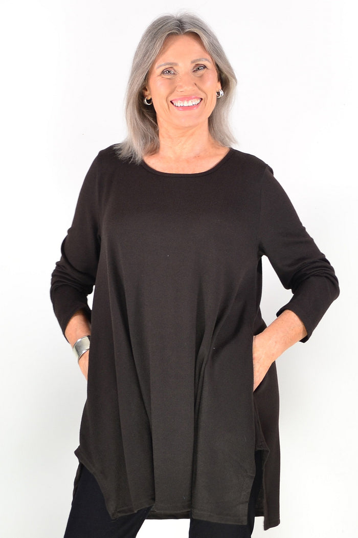 Dark brown winter fleece tunic top by Hourglass Avalon, featuring cozy fabric and a relaxed fit, displayed on a hanger.