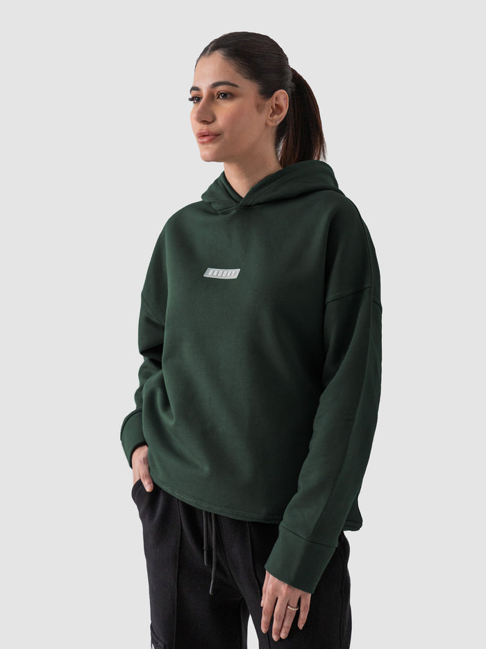 Dark green hoodie male model back view oversized relaxed fit Pakistan – GROOVY