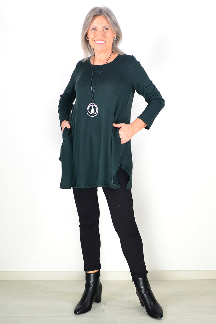 Dark green winter fleece tunic top by Hourglass Avalon, showing a cozy, long-sleeve fleece tunic with a relaxed fit.