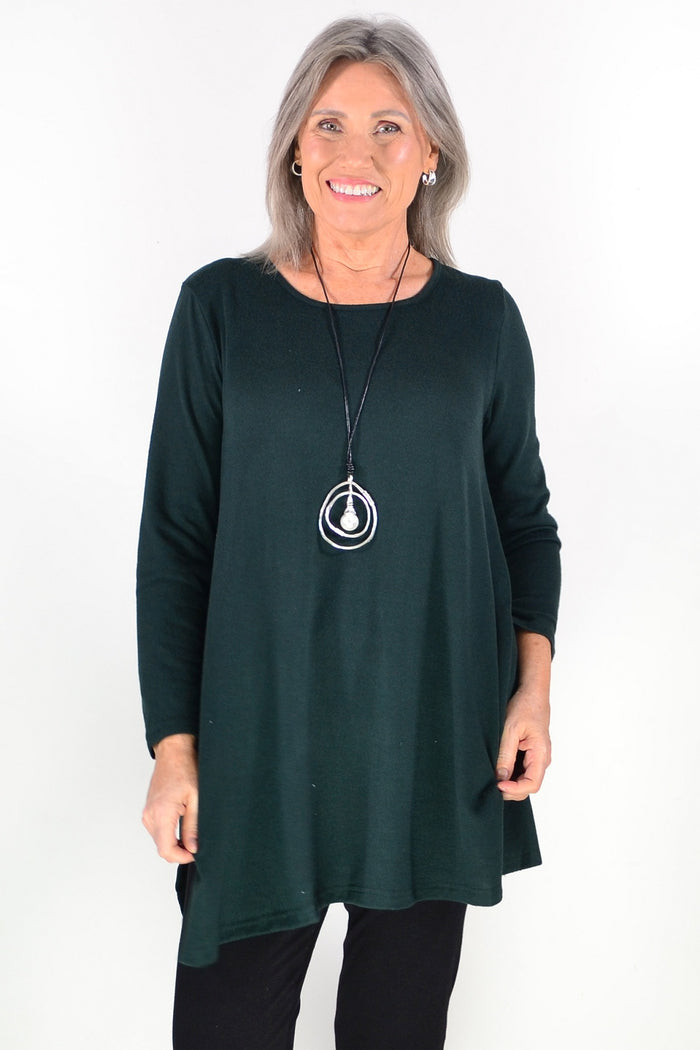 Dark green winter fleece tunic top by Hourglass Avalon, featuring a cozy, long-sleeve design with a relaxed fit.