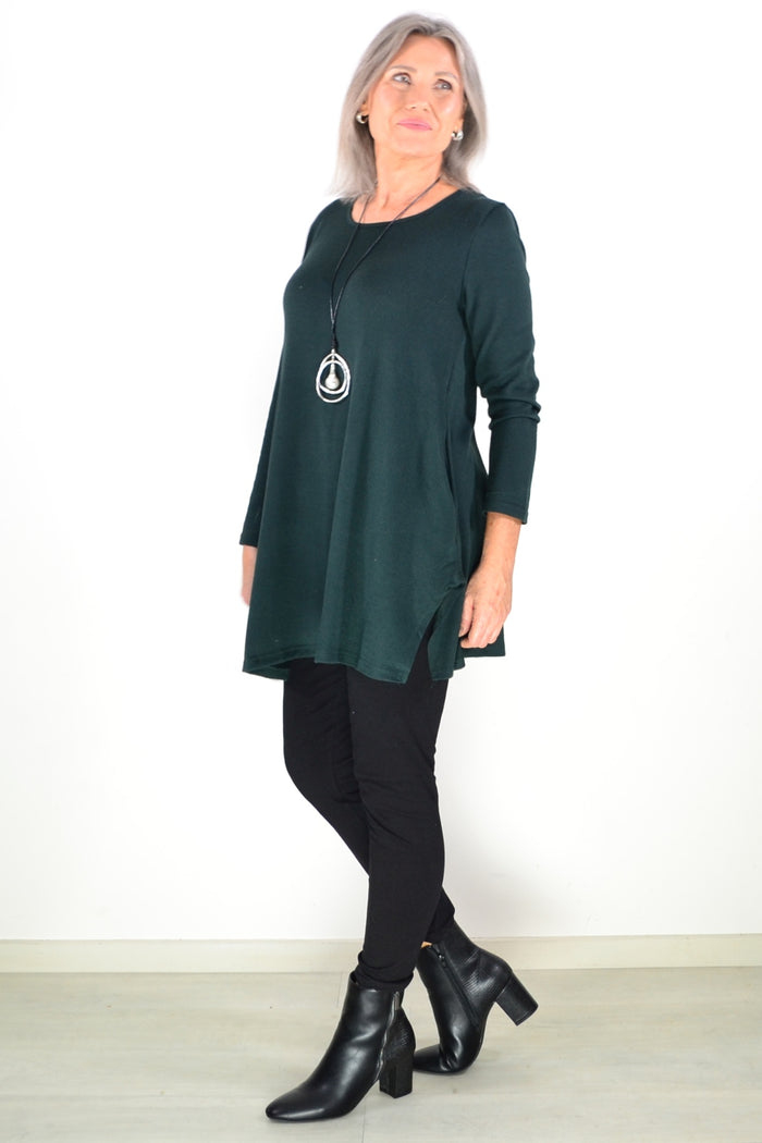 Dark green fleece tunic top by Hourglass Avalon, cozy winter tunic with long sleeves and a relaxed fit.