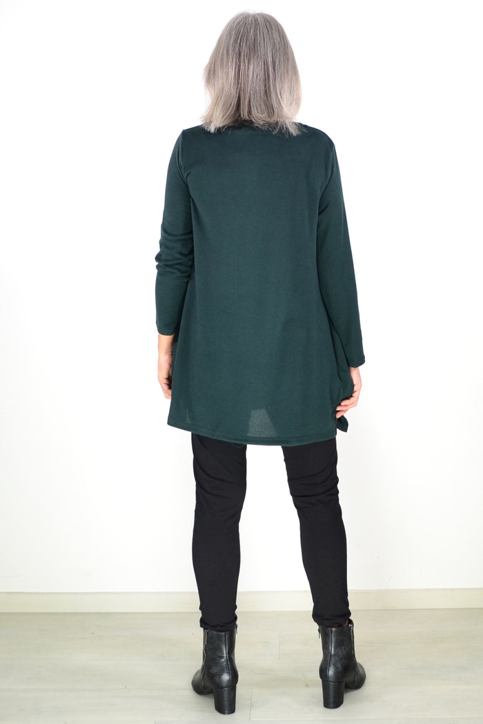 Dark green winter fleece tunic top by Hourglass Avalon, showcasing a cozy, long-sleeve design with a relaxed fit and textured fabric.