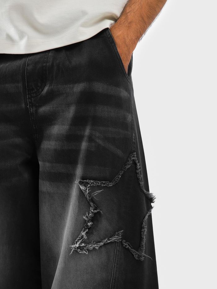 Five pocket construction on washed black trousers - GROOVY Pakistan