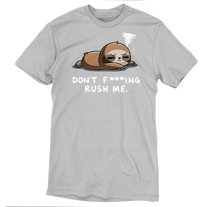 Premium Cotton T-shirt_TeeTurtle Don't F***ing Rush Me (Sloth) silver gray t-shirt featuring a sloth lying down with eyes half-closed, appearing tired. A small swirl above its head represents drowsiness. Text below reads, "DON'T F*ING RUSH ME."