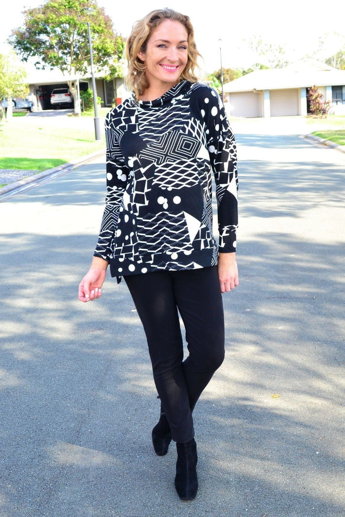Wishstone Dotty Do Little long sleeve fleece tunic top with playful dot pattern and cozy fabric, perfect for casual wear.